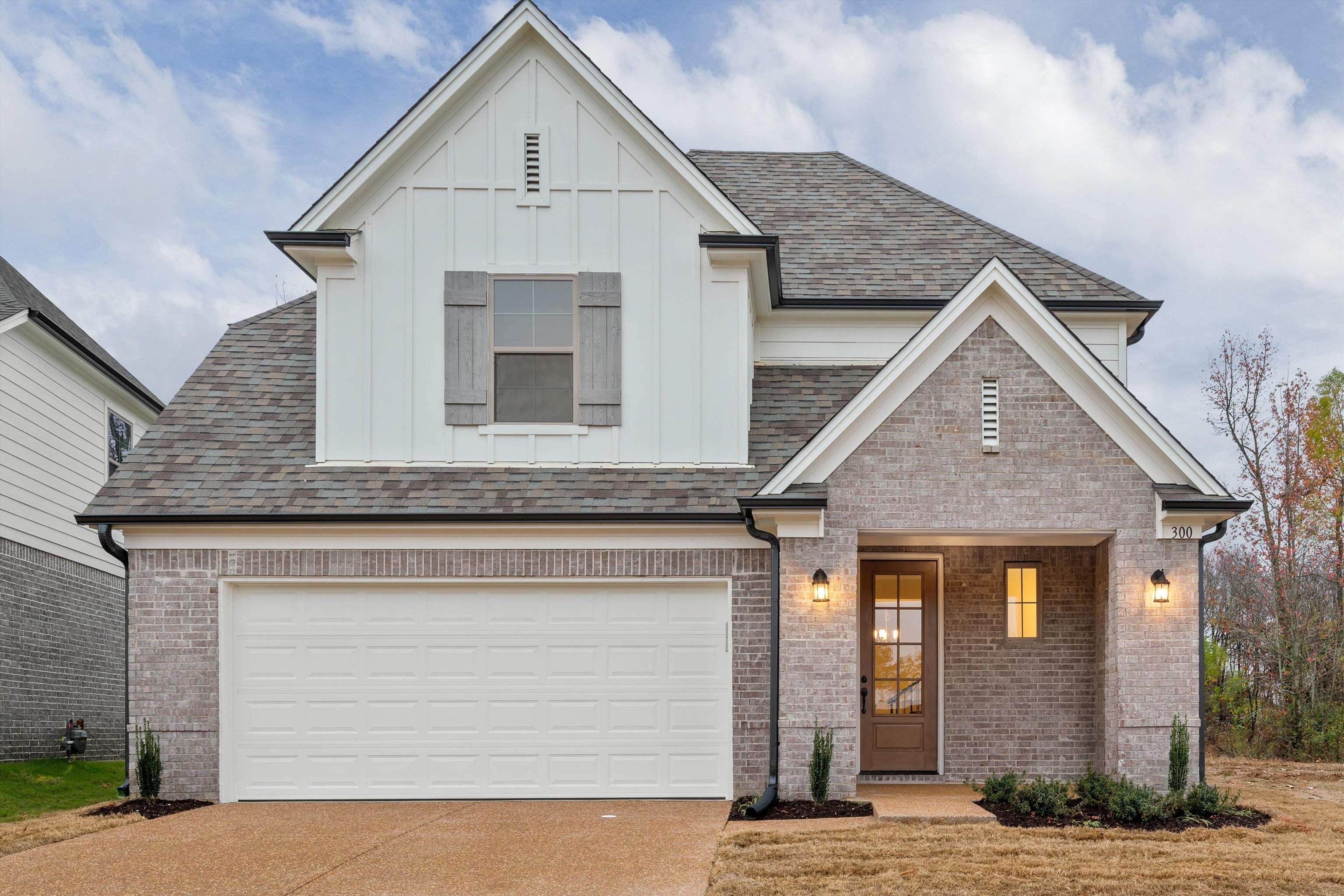 a view of house with garage