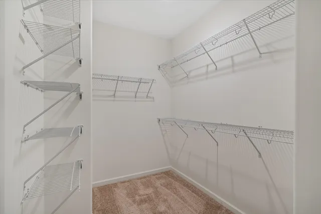 a view of a room with racks on the wall