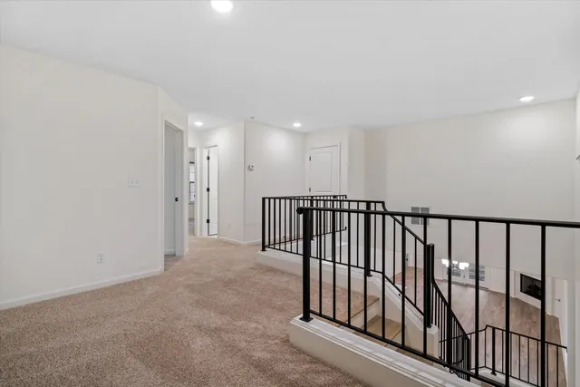 a view of a hallway with entryway