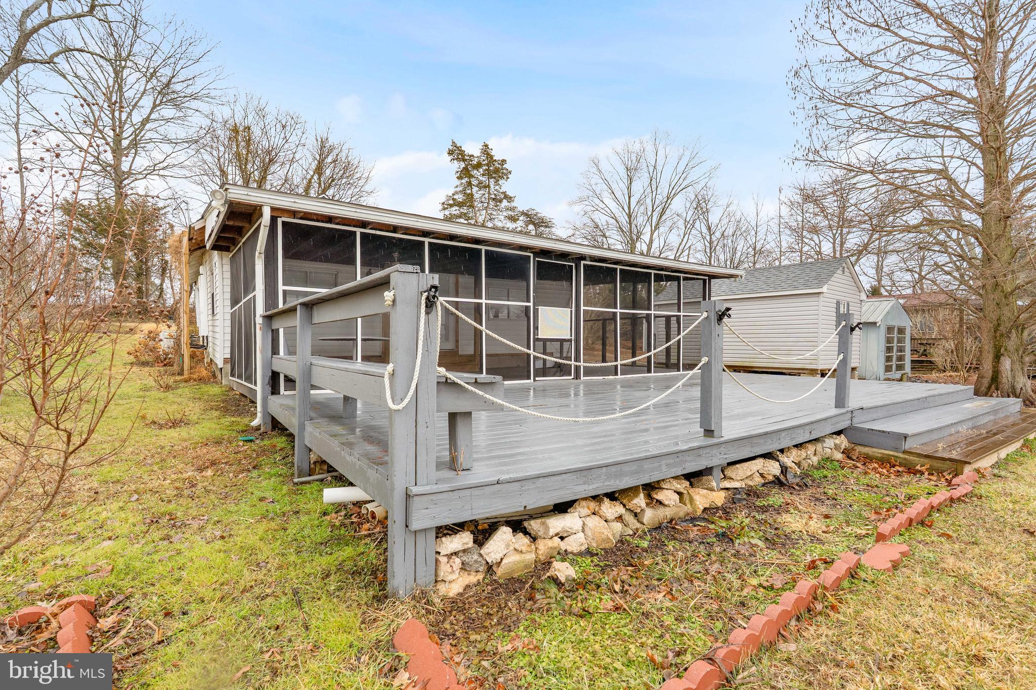 441 West Lewis Shore Road Elkton, MD 21921 - Photo 2 of 34 Large deck and screened porch.