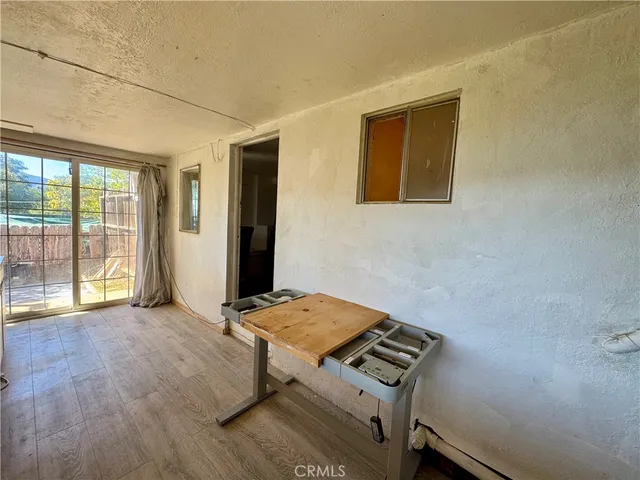 a view of an empty room and window