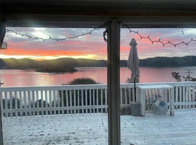 a view of a porch with a yard