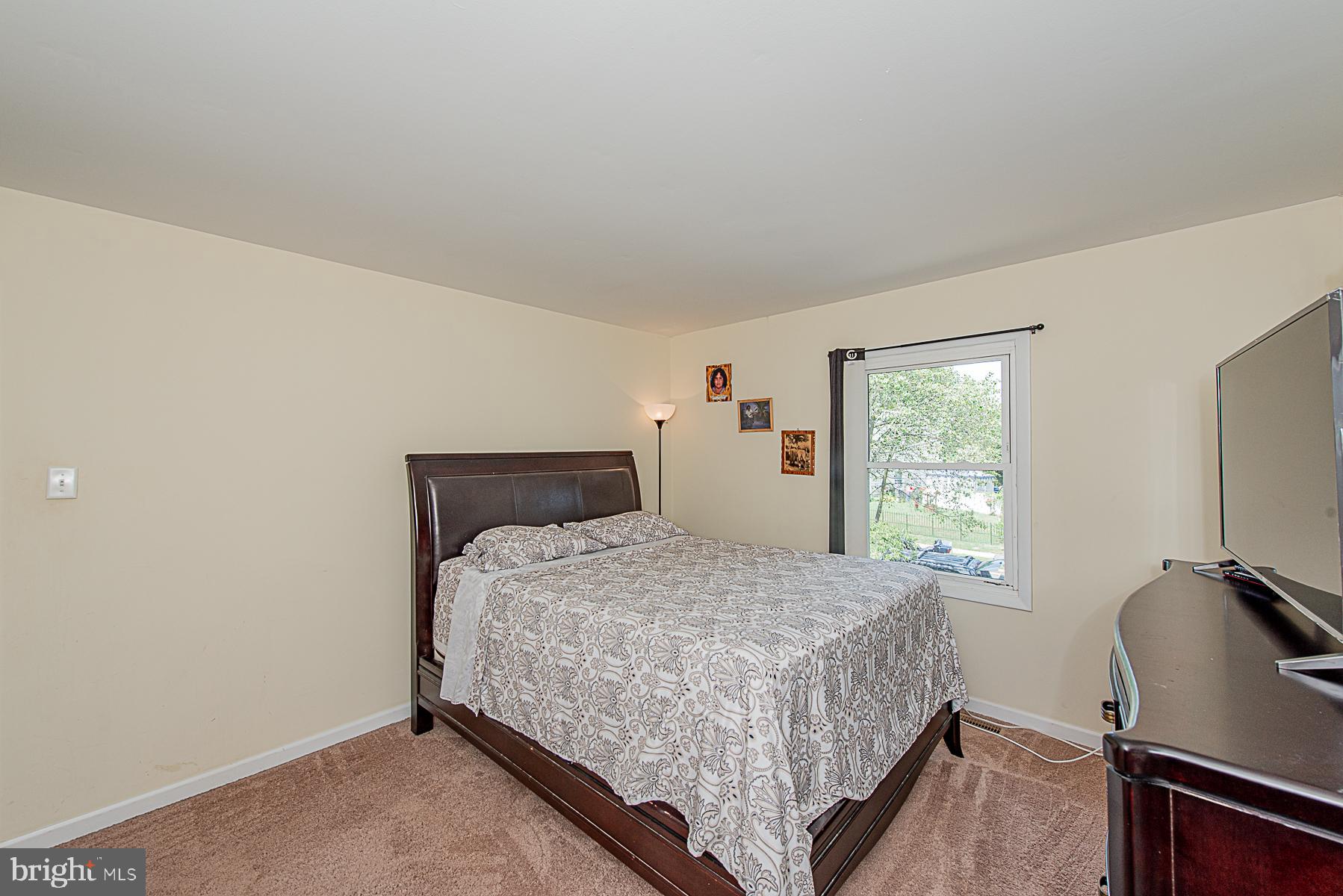 1308 Tenbrook Road Odenton, MD 21113 - Photo 15 of 32 MASTER BEDROOM WITH WALK-OUT TO PRIVATE DECK