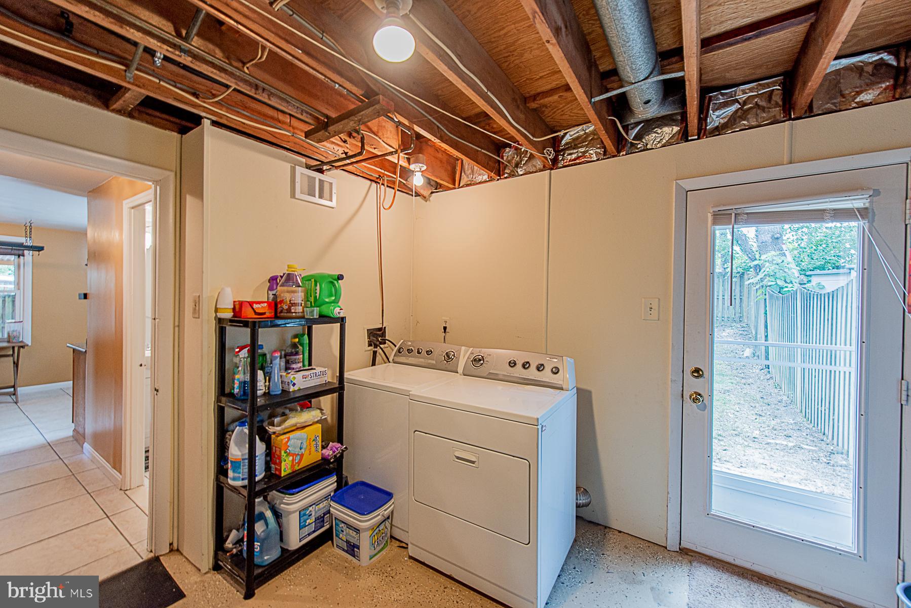 1308 Tenbrook Road Odenton, MD 21113 - Photo 25 of 32 LAUNDRY ROOM W/ WALK-OUT TO FENCED BACKYARD