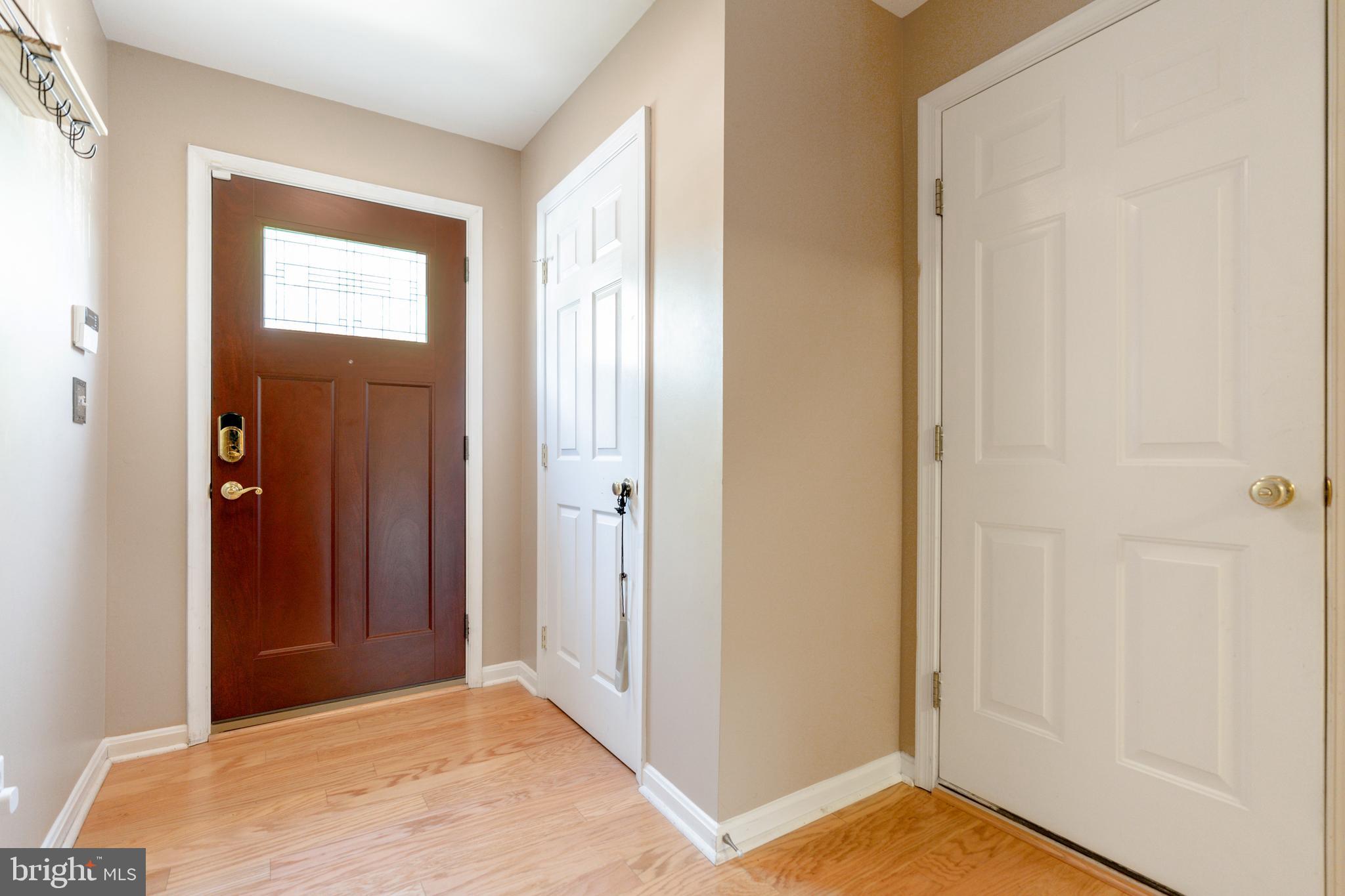4 West Glebe Road Alexandria, VA 22305 - Photo 3 of 37 Foyer opens to private suite.(BR 4 & full bath)