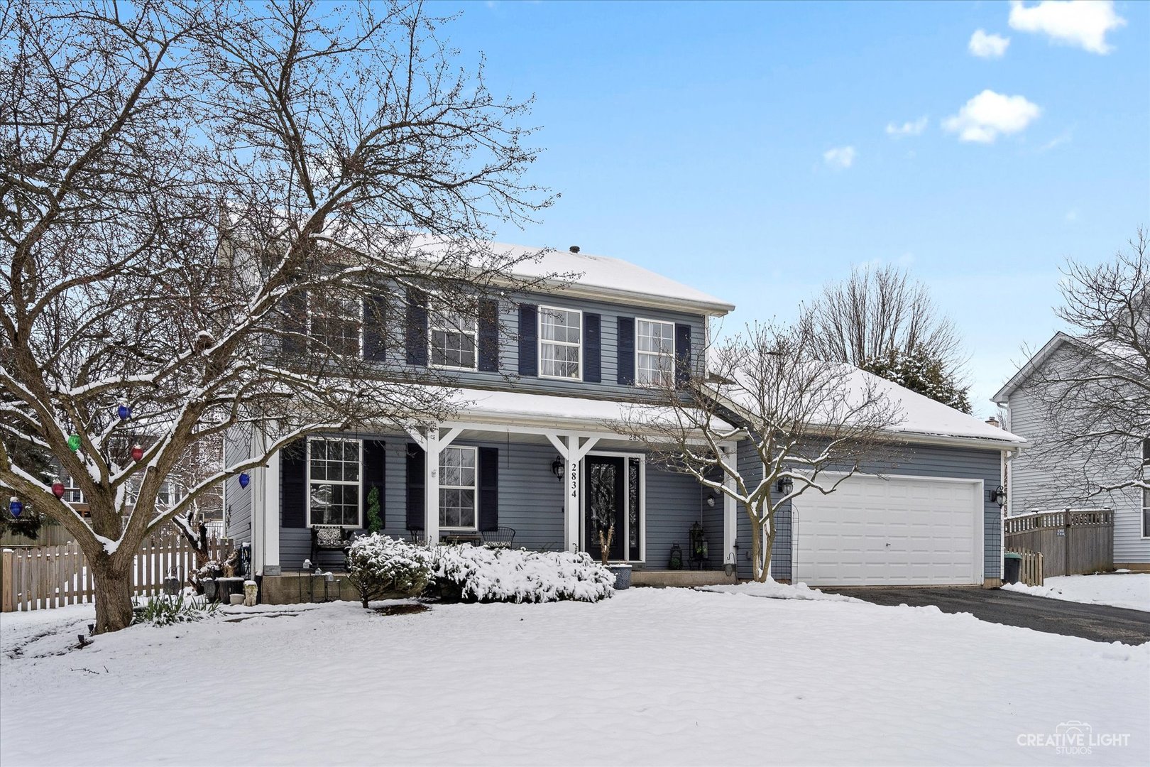 2834 Miller Road Geneva, IL 60134 - Photo 1 of 23 a front view of a house with a yard