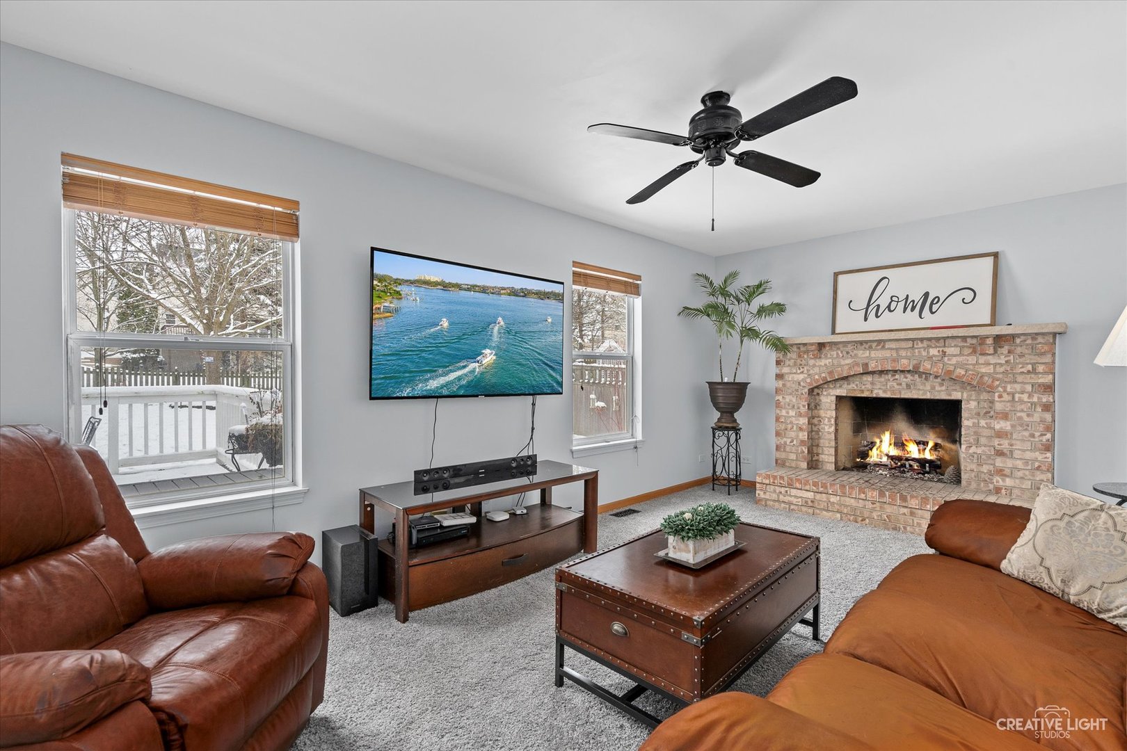 2834 Miller Road Geneva, IL 60134 - Photo 3 of 23 a living room with furniture and a fireplace