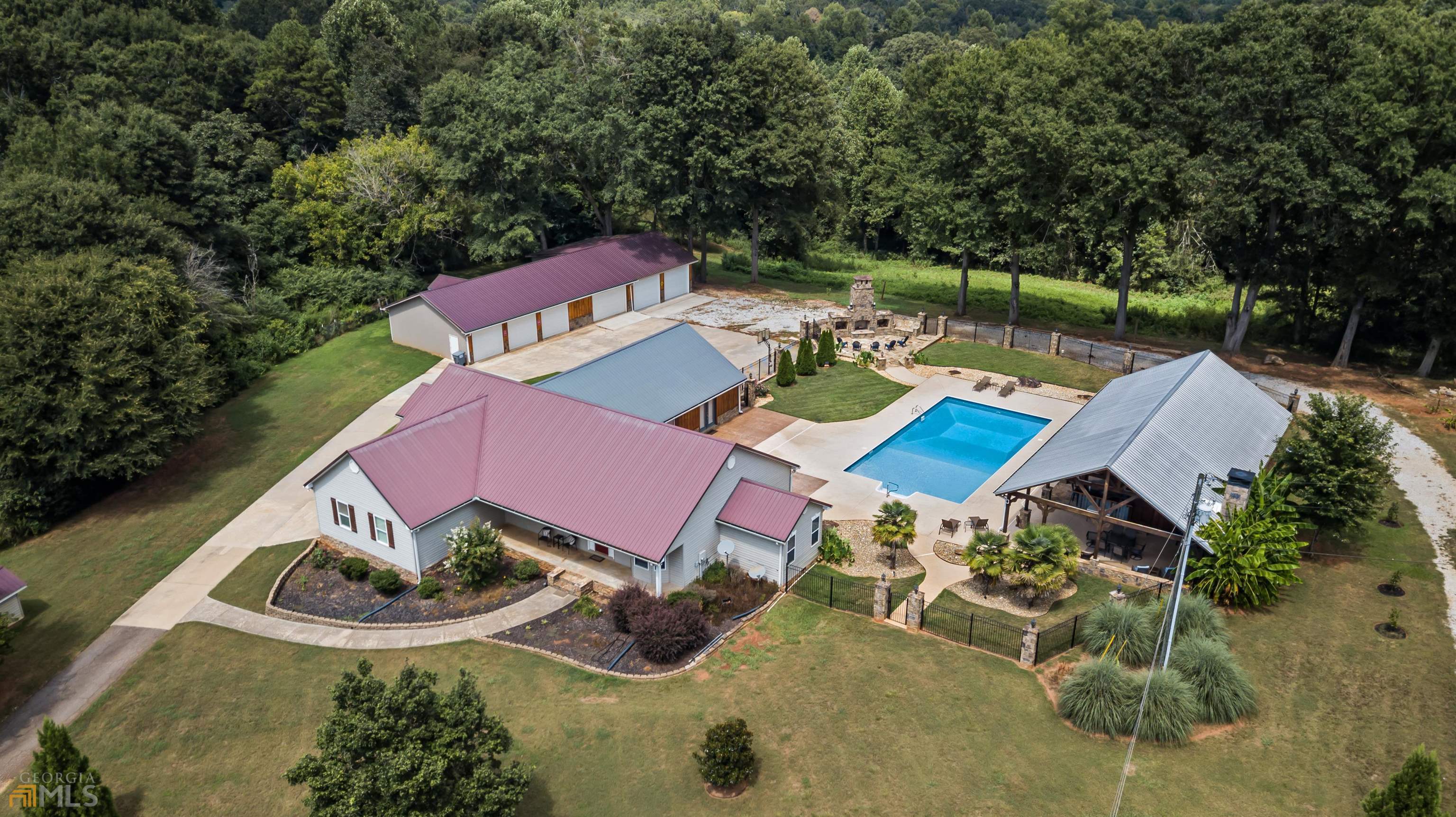 104 Farrow Lane Carnesville, GA 30521 - Photo 1 of 1 an aerial view of a house with garden space and street view