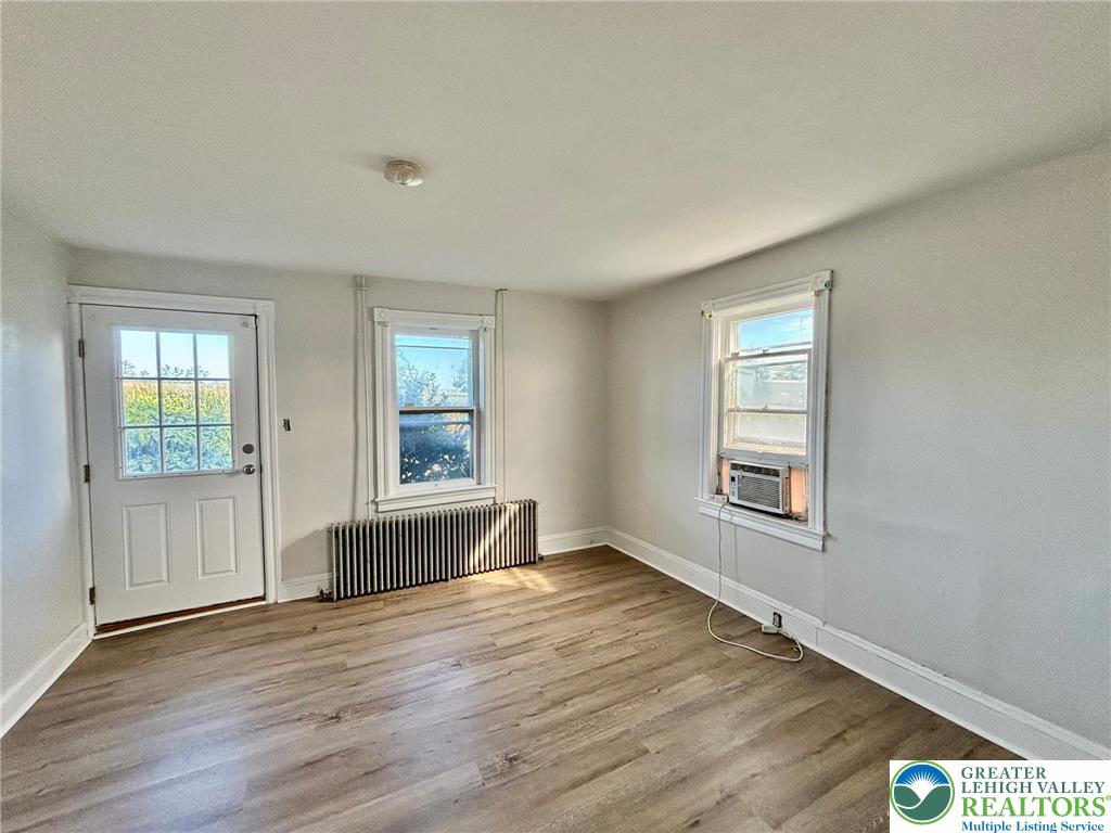 4067 Newburg Road Bethlehem, PA 18020 - Photo 12 of 19 Gleaming wood floors anchor this versatile room offering multiple windows and a private entrance.
