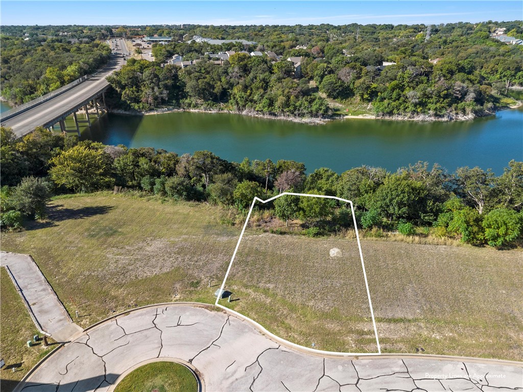 34 Enclave Court Waco, TX 76708 - Photo 4 of 20 an aerial view of a house with a lake view