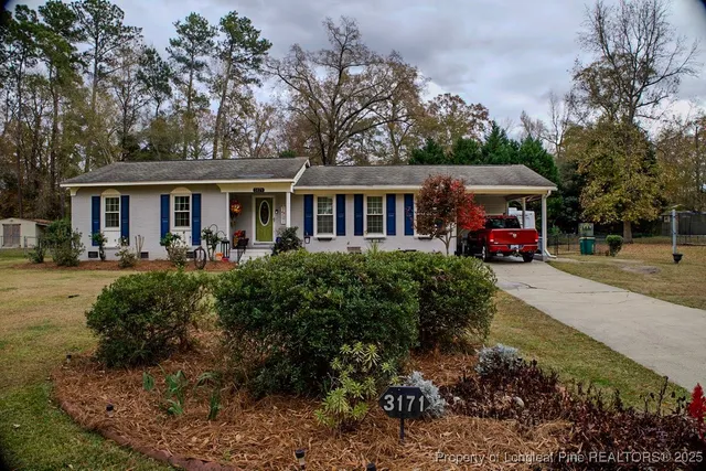 front view of a house with a patio