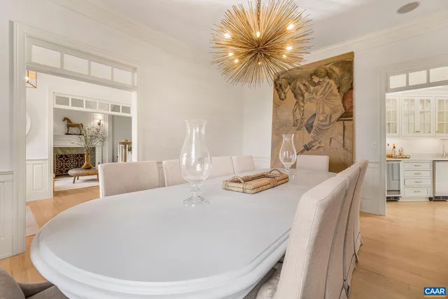 a living room with fireplace furniture and a flat screen tv