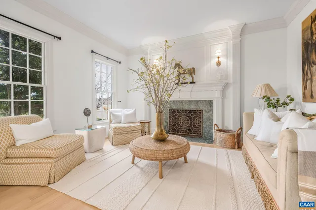 a view of a dining room with furniture and window