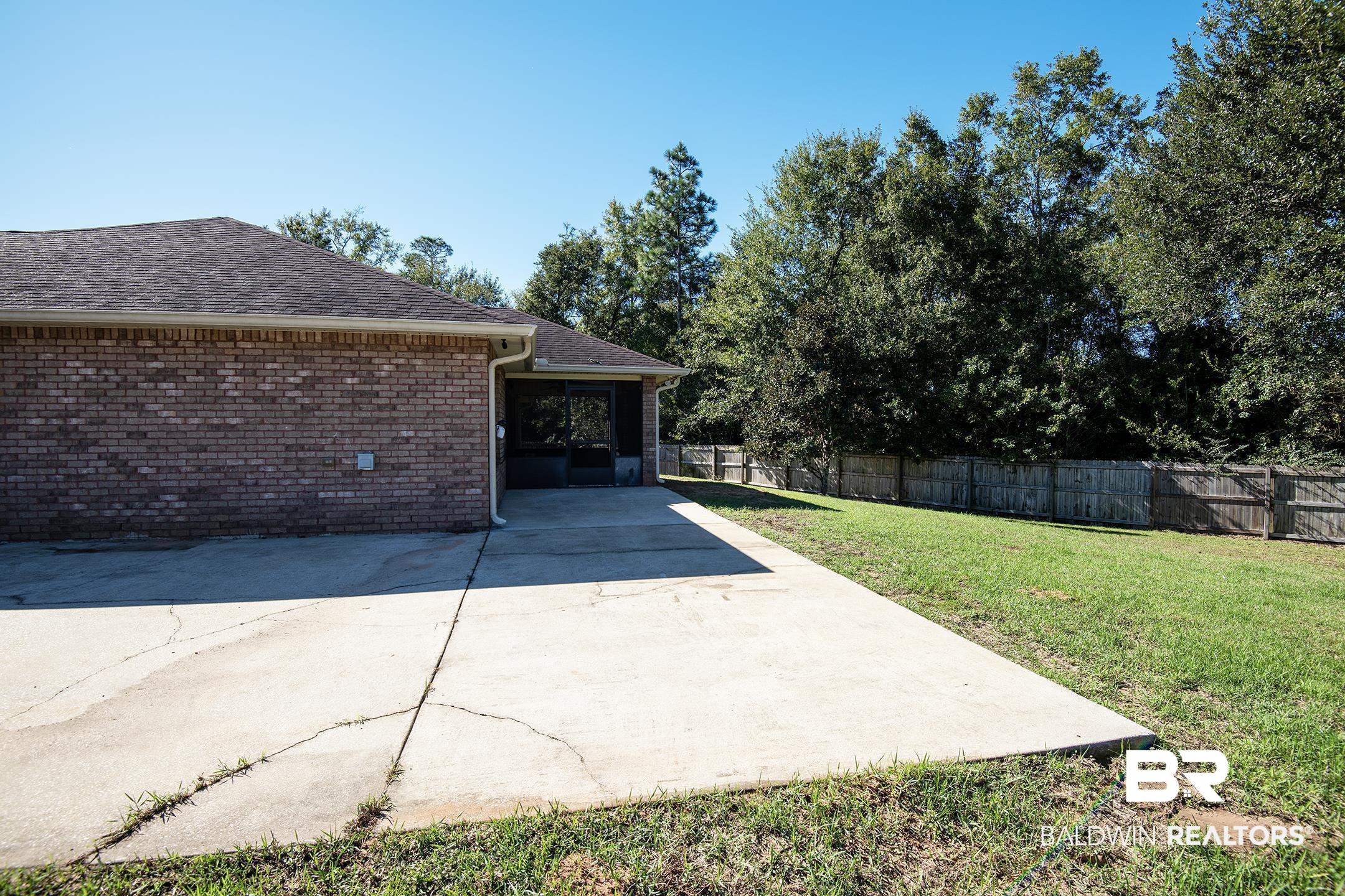 15345 Fremont Court Foley, AL 36535 - Photo 32 of 35 View of yard with a patio area
