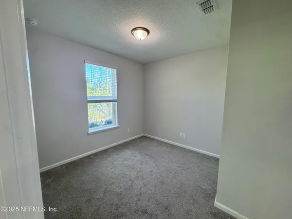 an empty room with closet