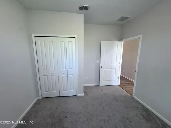a bathroom with a sink toilet and vanity