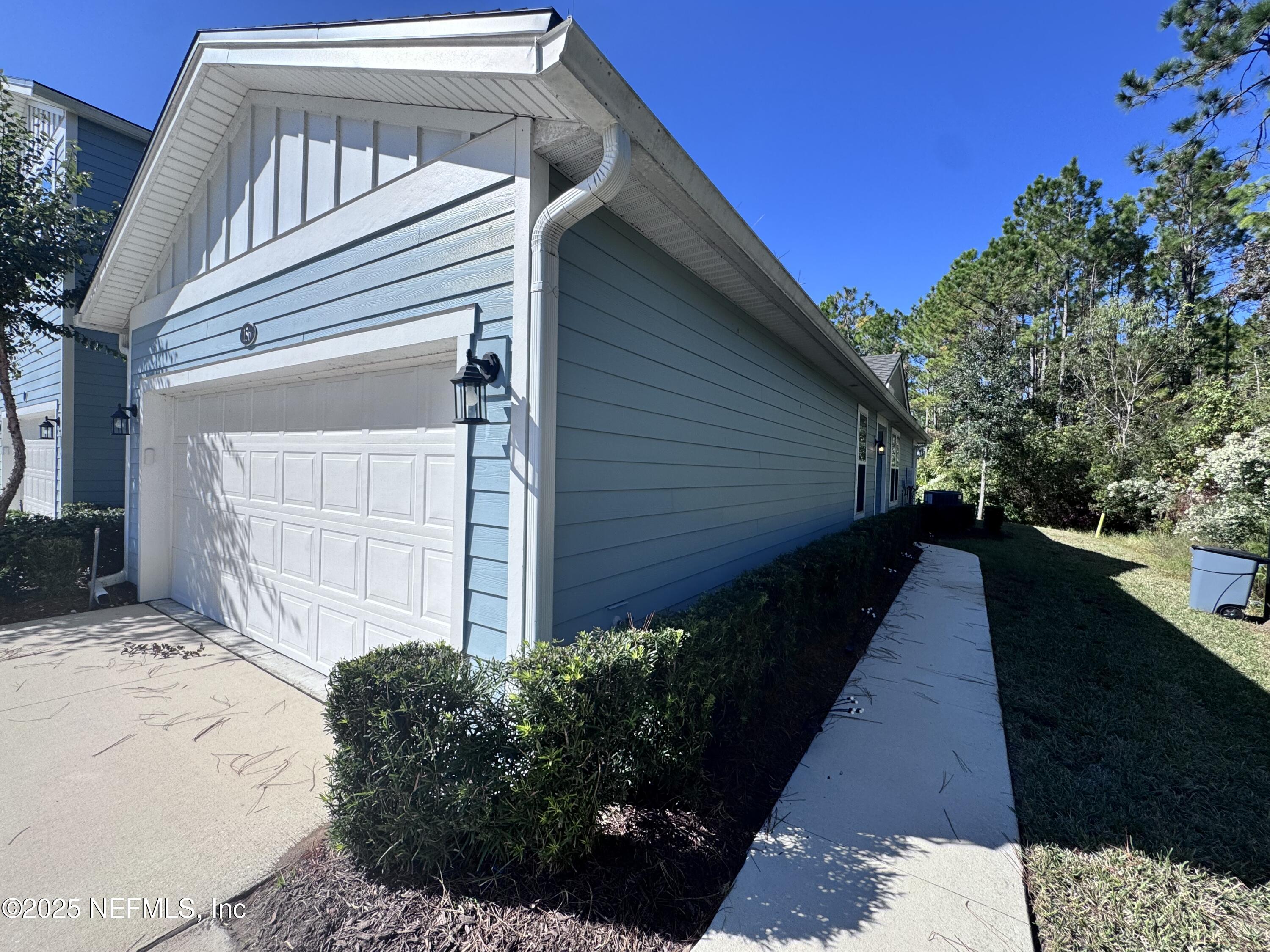 156 Charlie Way St. Augustine, FL 32095 - Photo 2 of 33 a view of a house with a yard