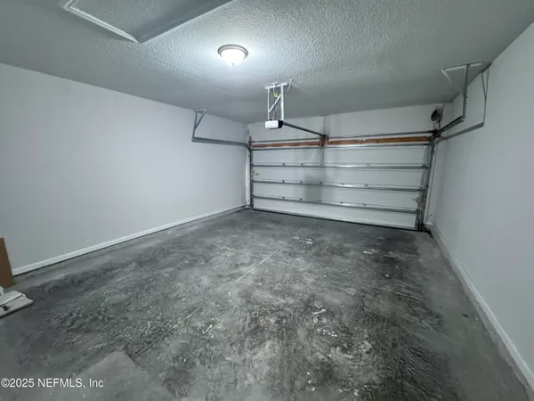 a view of backyard with green space