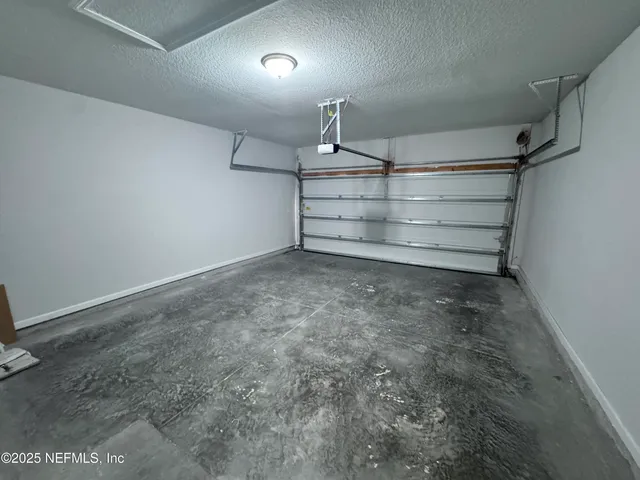 a view of backyard with green space