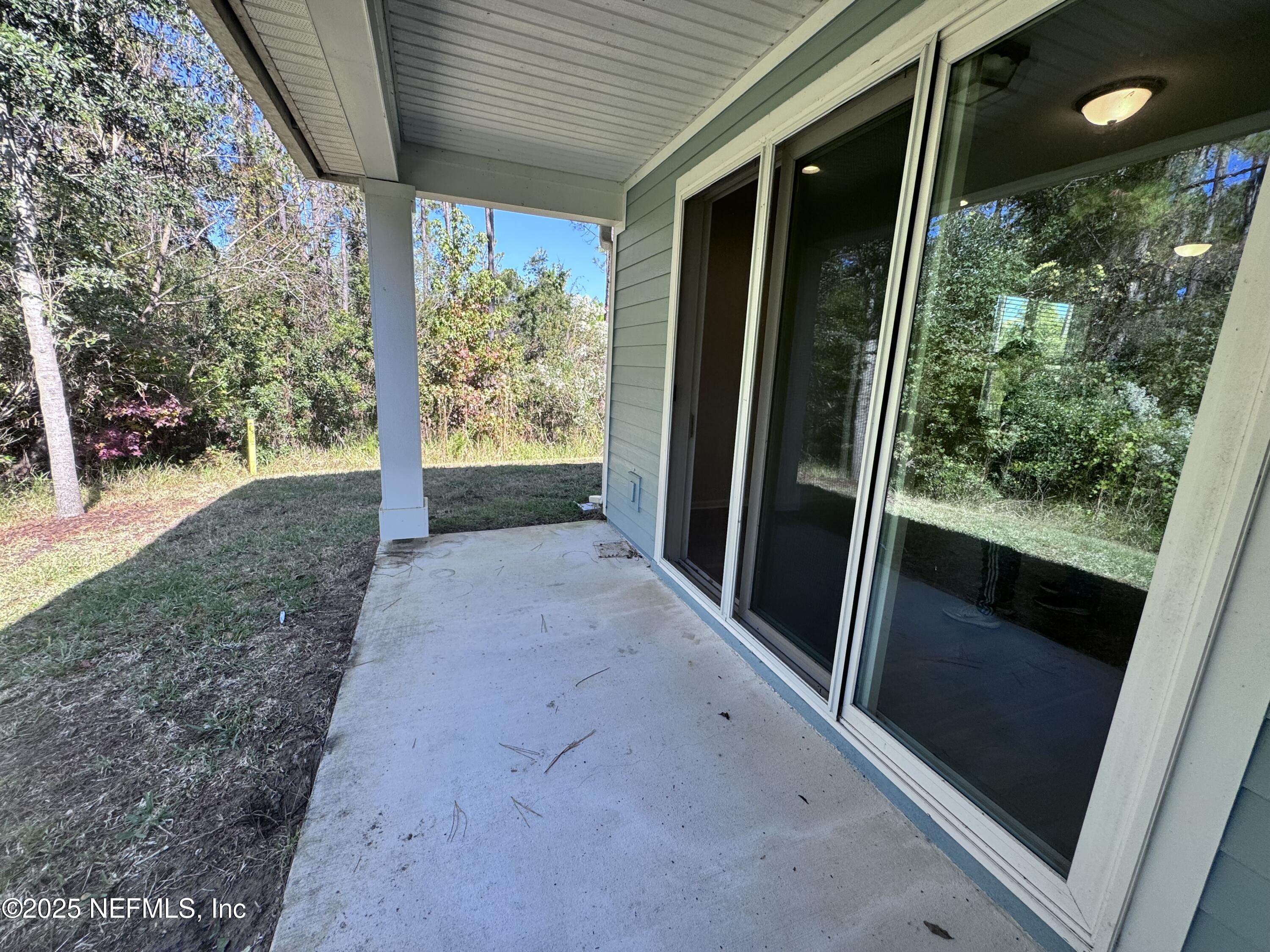 156 Charlie Way St. Augustine, FL 32095 - Photo 28 of 33 a view of backyard with green space
