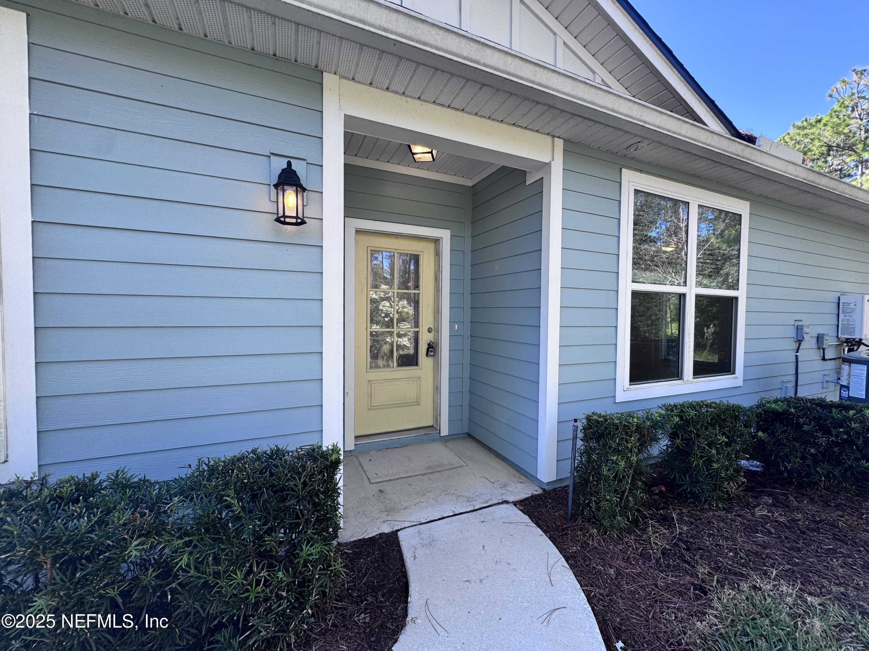 156 Charlie Way St. Augustine, FL 32095 - Photo 3 of 33 a view of front door of house