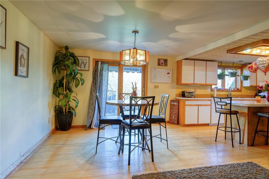 420 Three Degree Road Renfrew, PA 16053 - Photo 11 of 25 a view of a dining room with furniture window and wooden floor