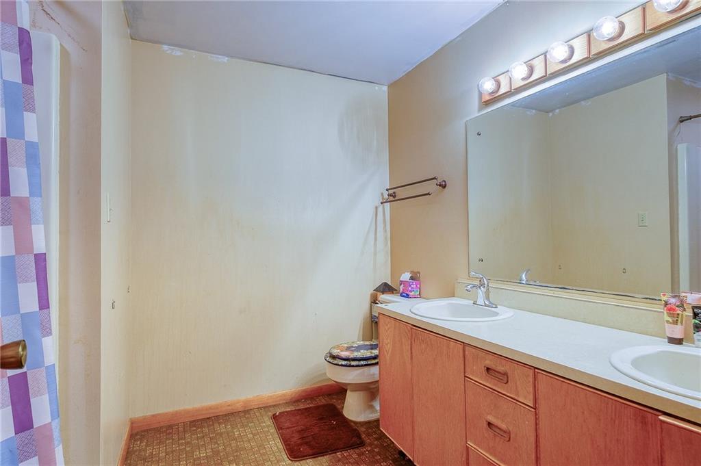 420 Three Degree Road Renfrew, PA 16053 - Photo 14 of 25 a bathroom with a sink and a toilet