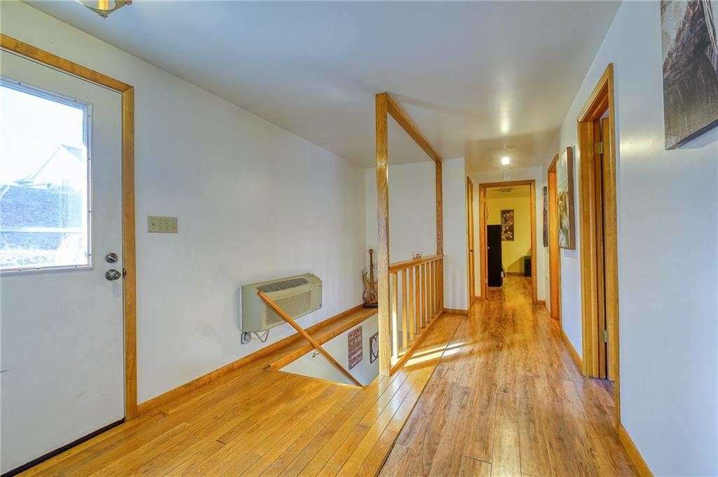 420 Three Degree Road Renfrew, PA 16053 - Photo 17 of 25 a view of a hallway with wooden floor