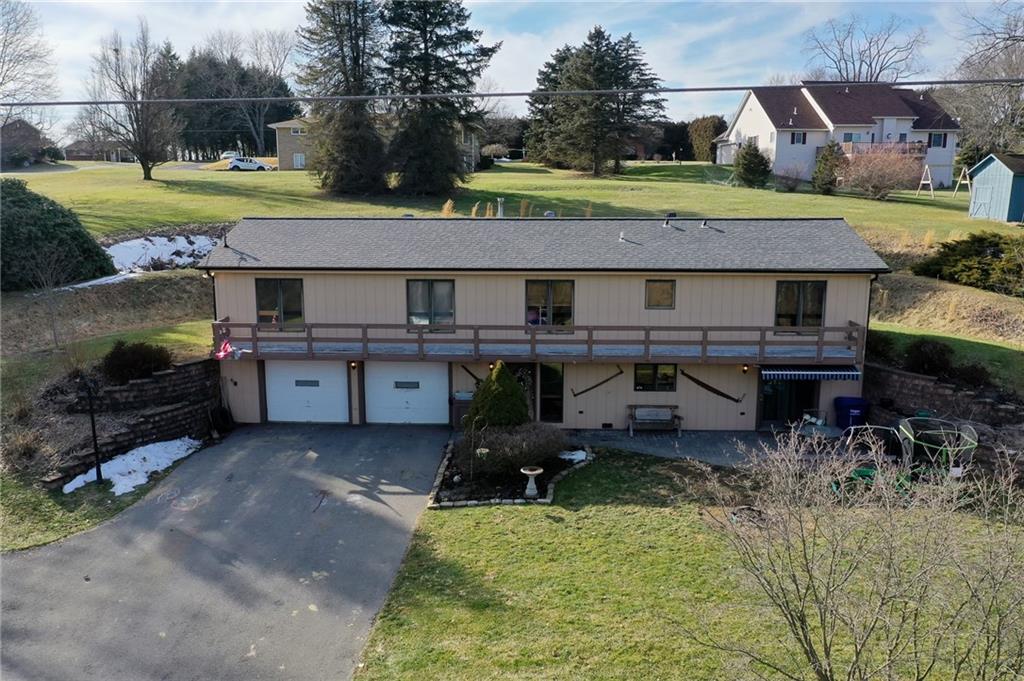 420 Three Degree Road Renfrew, PA 16053 - Photo 24 of 25 an aerial view of a house with swimming pool and a yard