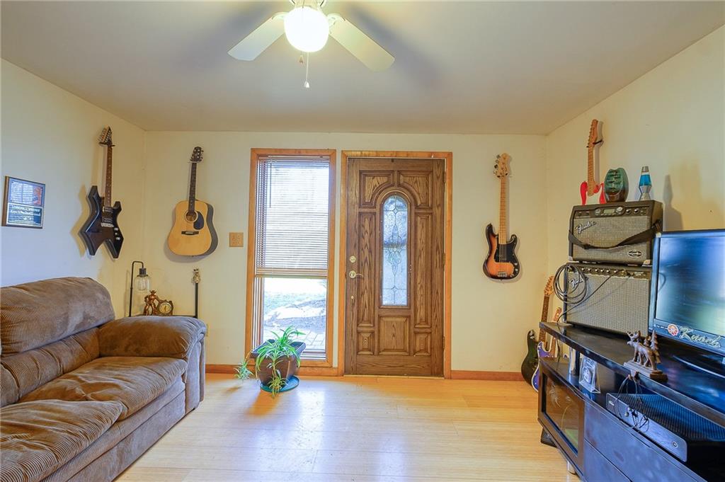 420 Three Degree Road Renfrew, PA 16053 - Photo 3 of 25 a living room with furniture and a window