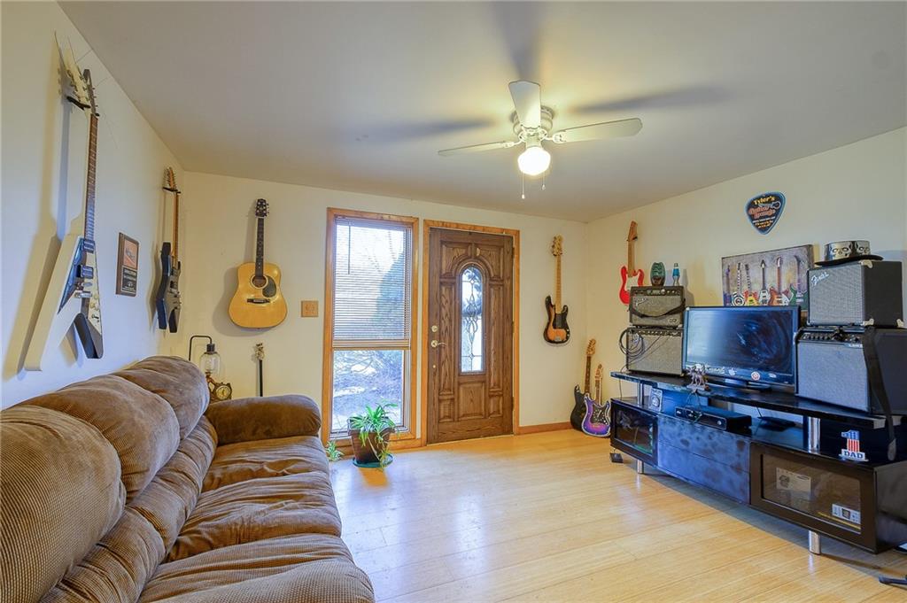 420 Three Degree Road Renfrew, PA 16053 - Photo 4 of 25 a living room with furniture and a flat screen tv