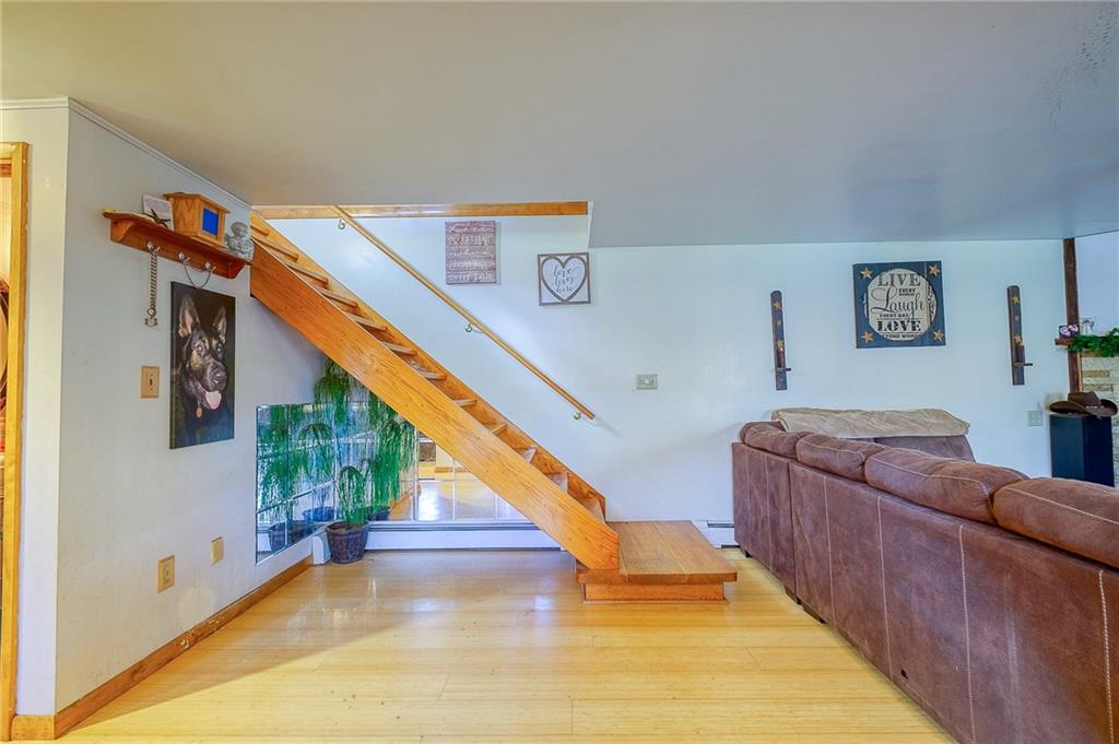 420 Three Degree Road Renfrew, PA 16053 - Photo 7 of 25 a living room with furniture and stairs