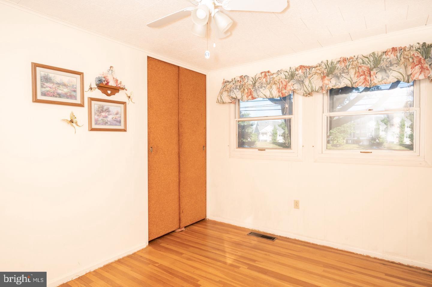 691 North Lewis Road Royersford, PA 19468 - Photo 11 of 21 a view of a bedroom with wooden floor and windows