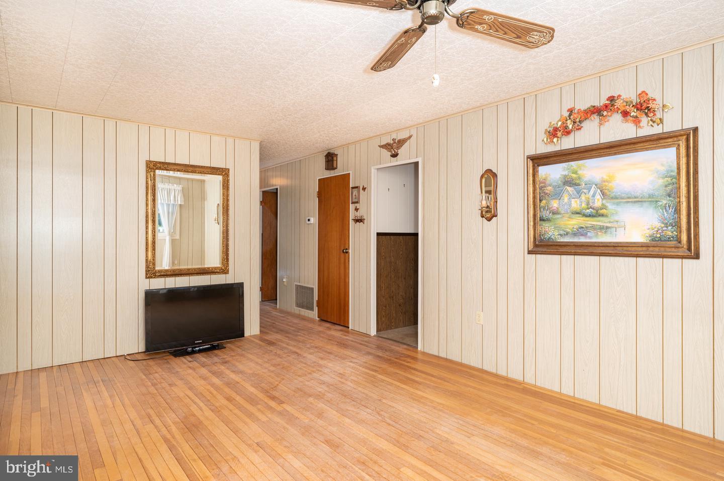 691 North Lewis Road Royersford, PA 19468 - Photo 2 of 21 a view of a bedroom with wooden floor and window