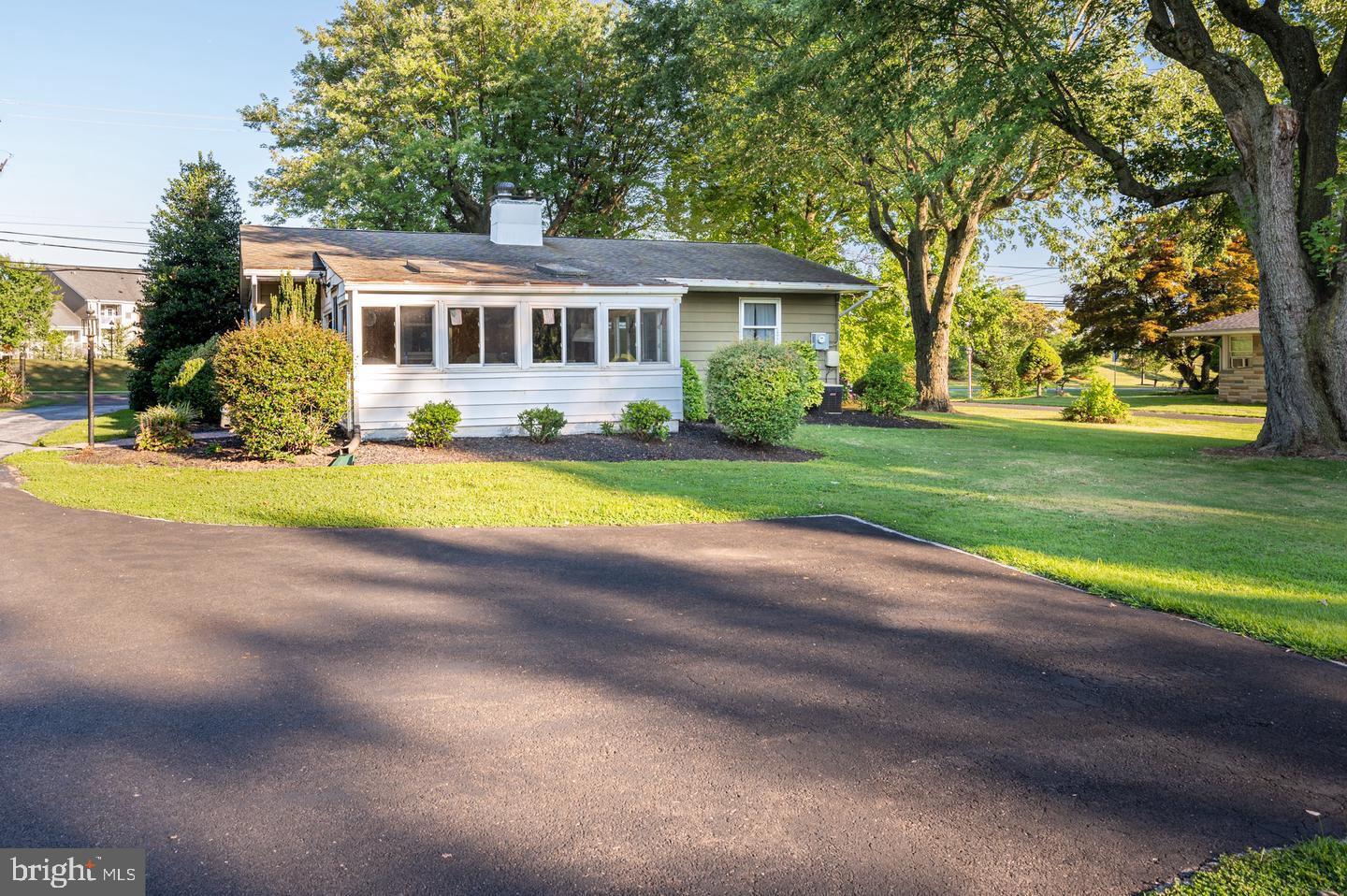 691 North Lewis Road Royersford, PA 19468 - Photo 21 of 21 a front view of a house with a yard and garage