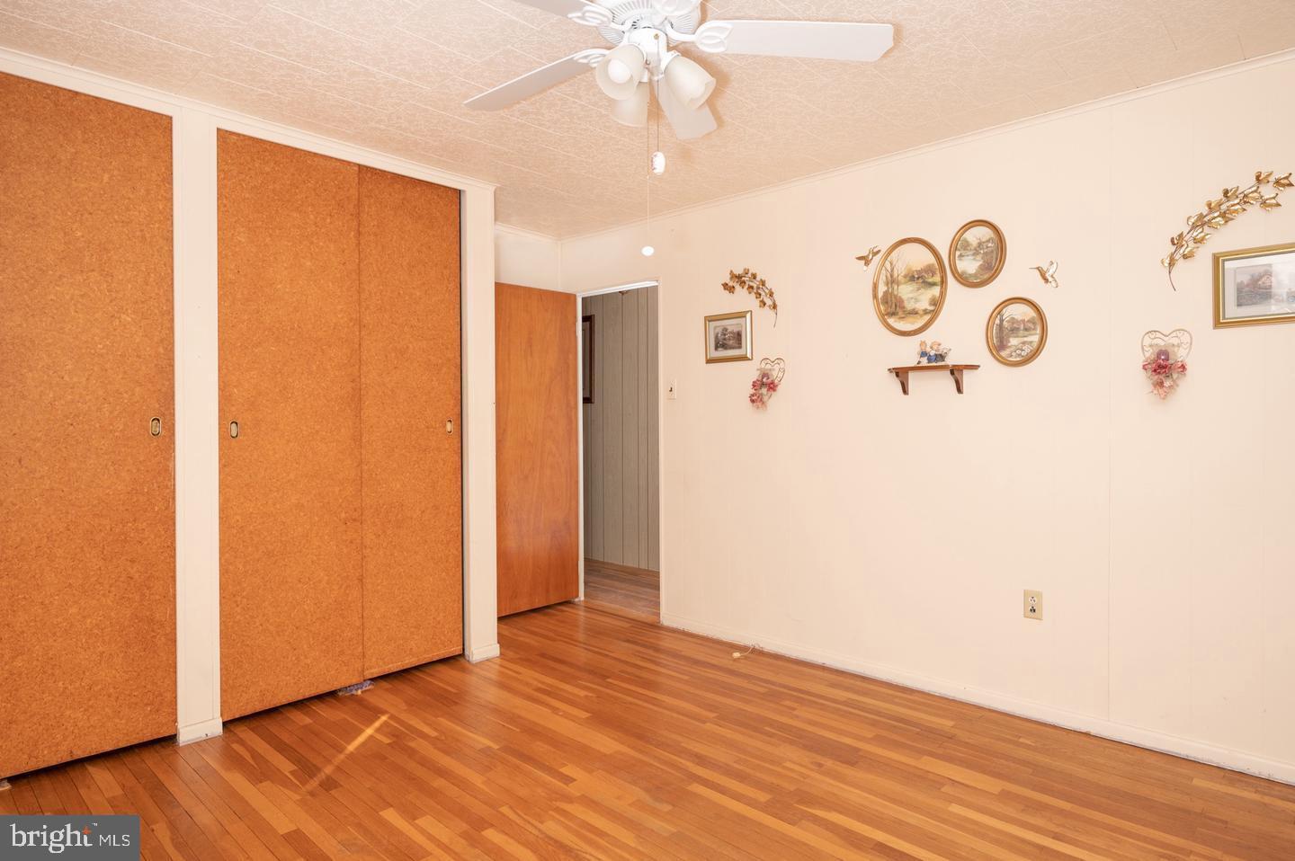 691 North Lewis Road Royersford, PA 19468 - Photo 7 of 21 a view of an empty room with wooden floor