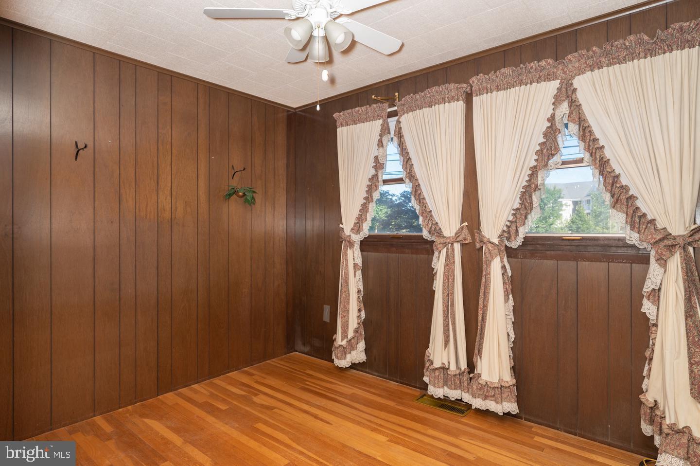 691 North Lewis Road Royersford, PA 19468 - Photo 8 of 21 a view of empty room with wooden floor and fan