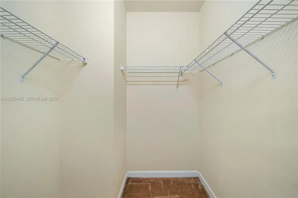 a view of small space with racks on the wall