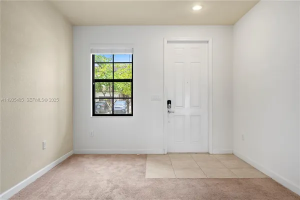 an empty room with windows