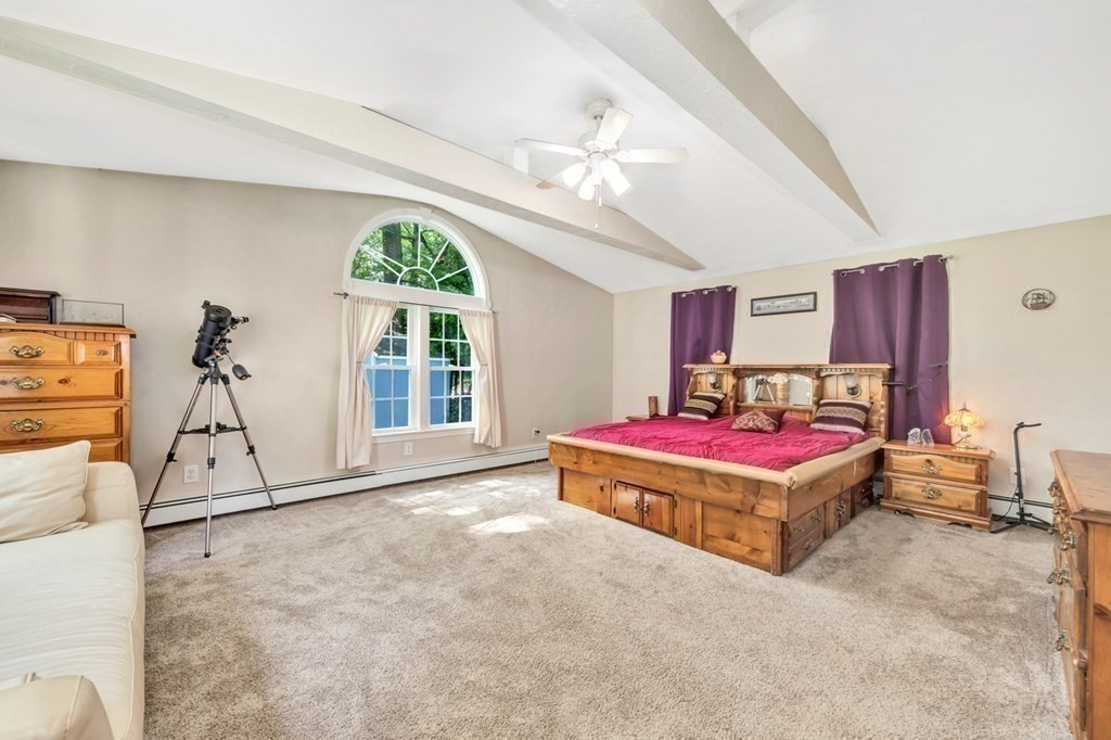 49 Woodland Road Ashland, MA 01721 - Photo 17 of 36 a bedroom with furniture and windows
