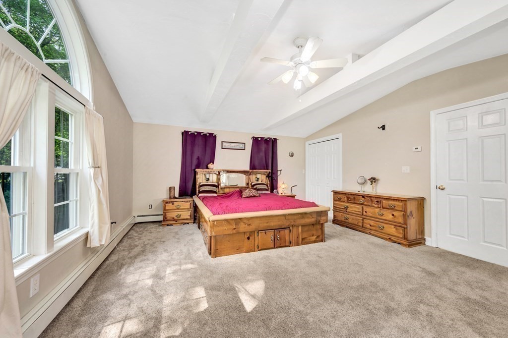 49 Woodland Road Ashland, MA 01721 - Photo 19 of 36 a bedroom with furniture and window