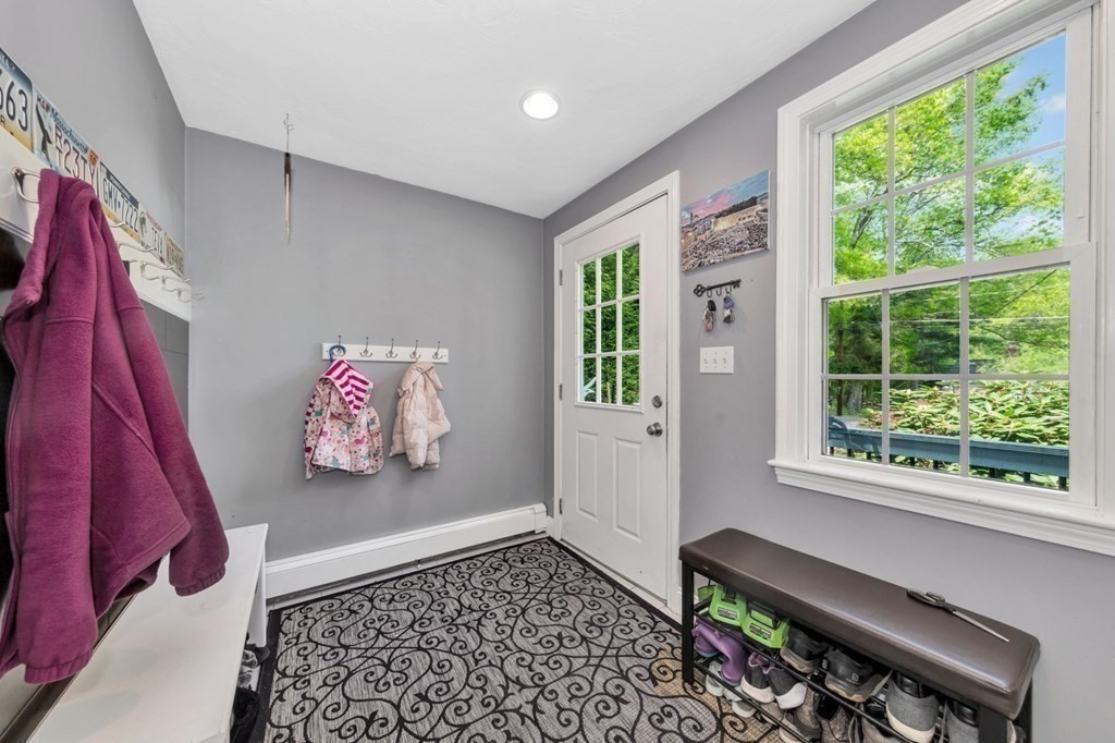 49 Woodland Road Ashland, MA 01721 - Photo 20 of 36 a view of a bedroom with furniture and window