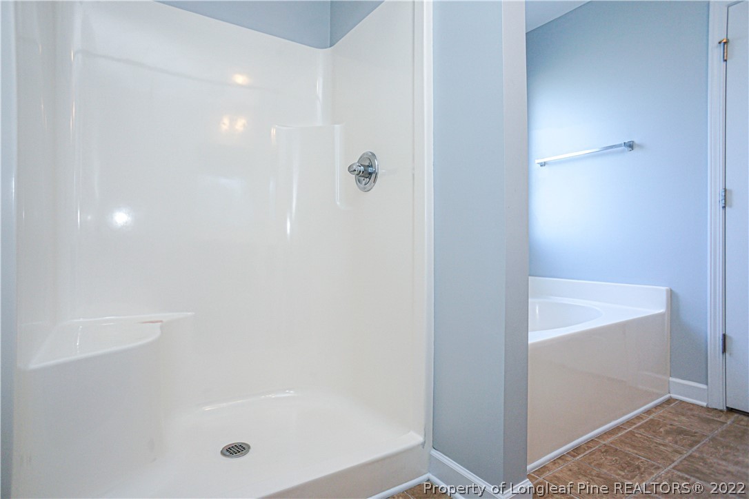 286 Cape Fear Road Raeford, NC 28376 - Photo 24 of 46 a bathroom with a tub