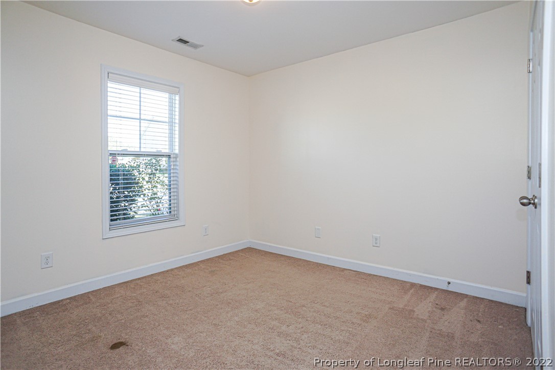 286 Cape Fear Road Raeford, NC 28376 - Photo 39 of 46 an empty room with a window