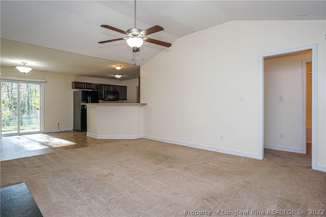 286 Cape Fear Road Raeford, NC 28376 - Photo 4 of 46 a view of an empty room with a window
