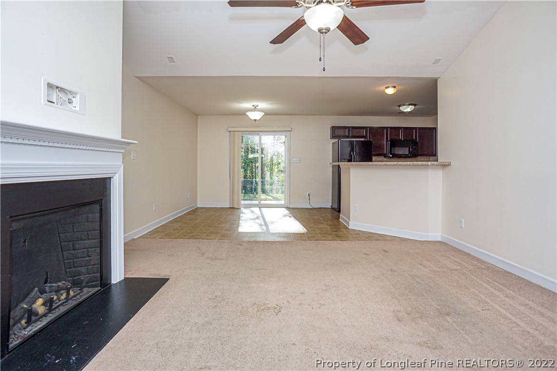 286 Cape Fear Road Raeford, NC 28376 - Photo 7 of 46 a view of a livingroom with a fireplace