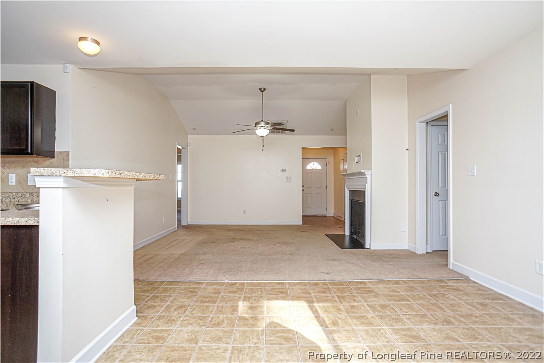 286 Cape Fear Road Raeford, NC 28376 - Photo 10 of 46 a view of a kitchen with a sink and a refrigerator