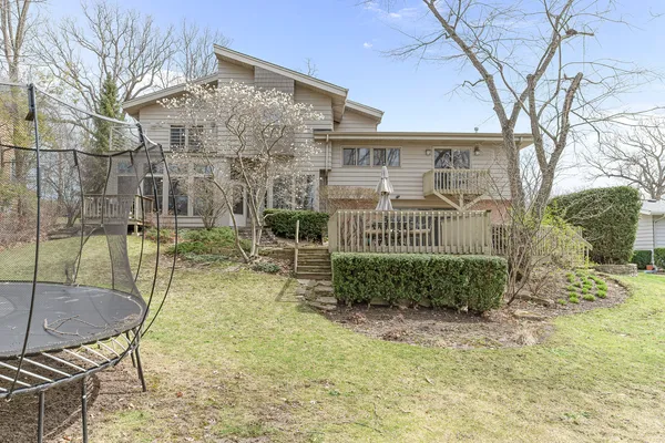 a view of a patio with a yard