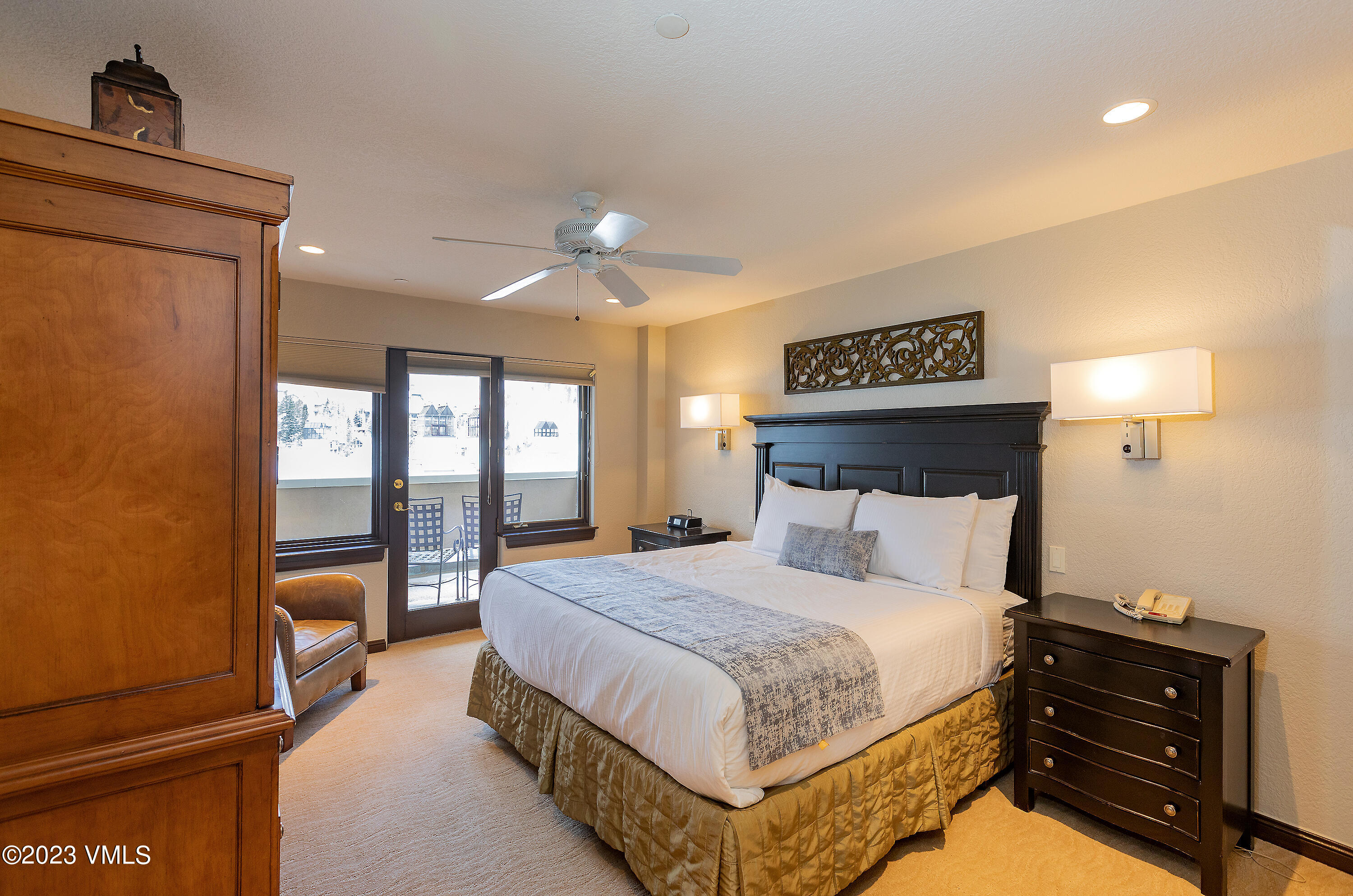 210 Offerson Road, Unit 207 WEEK 51 & 52 Beaver Creek, CO 81620 - Photo 18 of 26 a bedroom with a bed and wooden floor