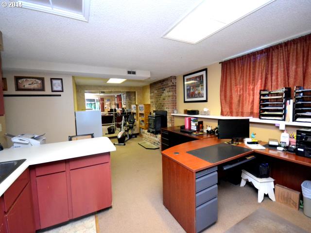 22871 South Reid Road Estacada, OR 97023 - Photo 10 of 16 a room with furniture a large window and a sink